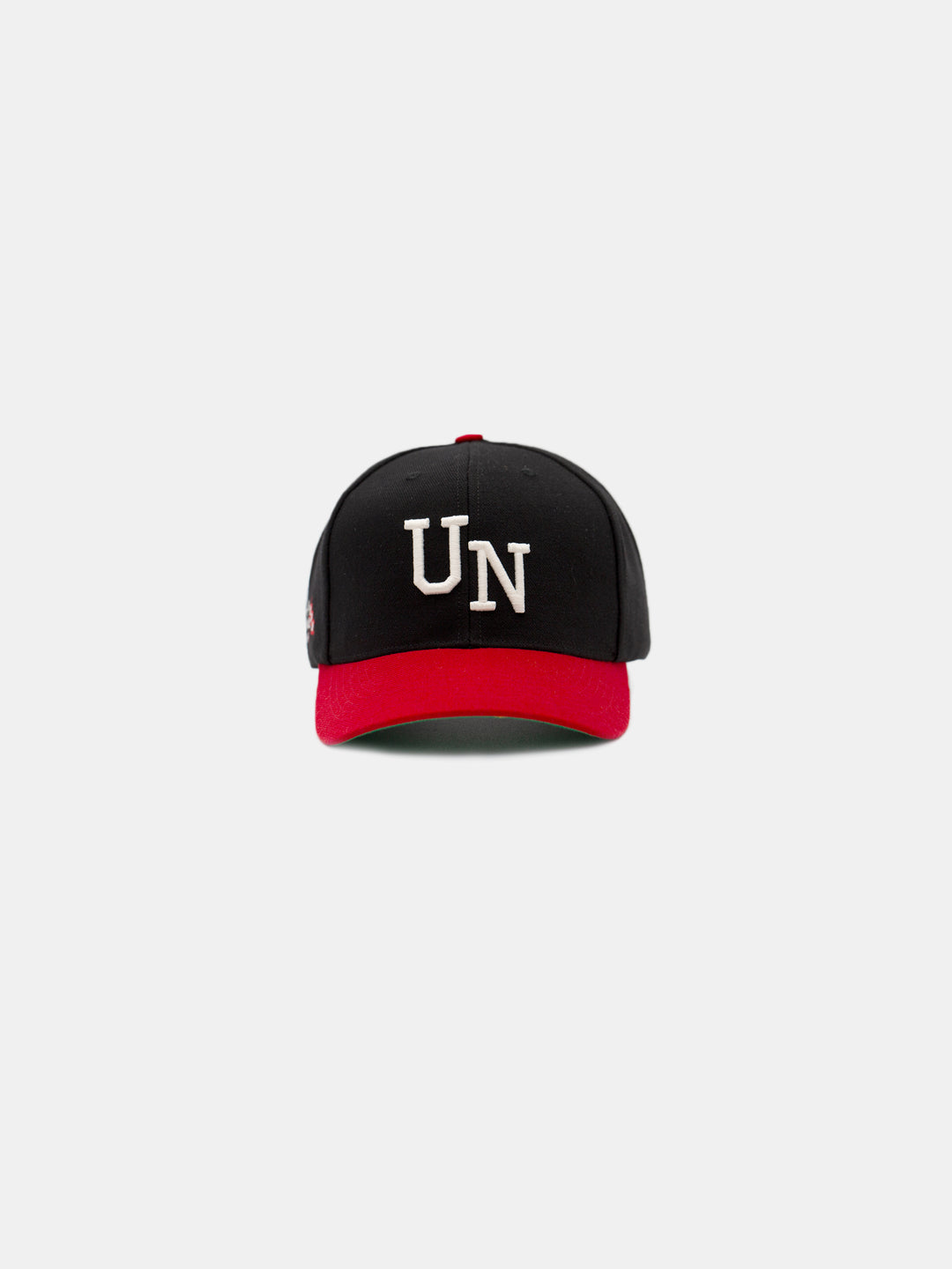 front of un chosen snapback hat in black and red