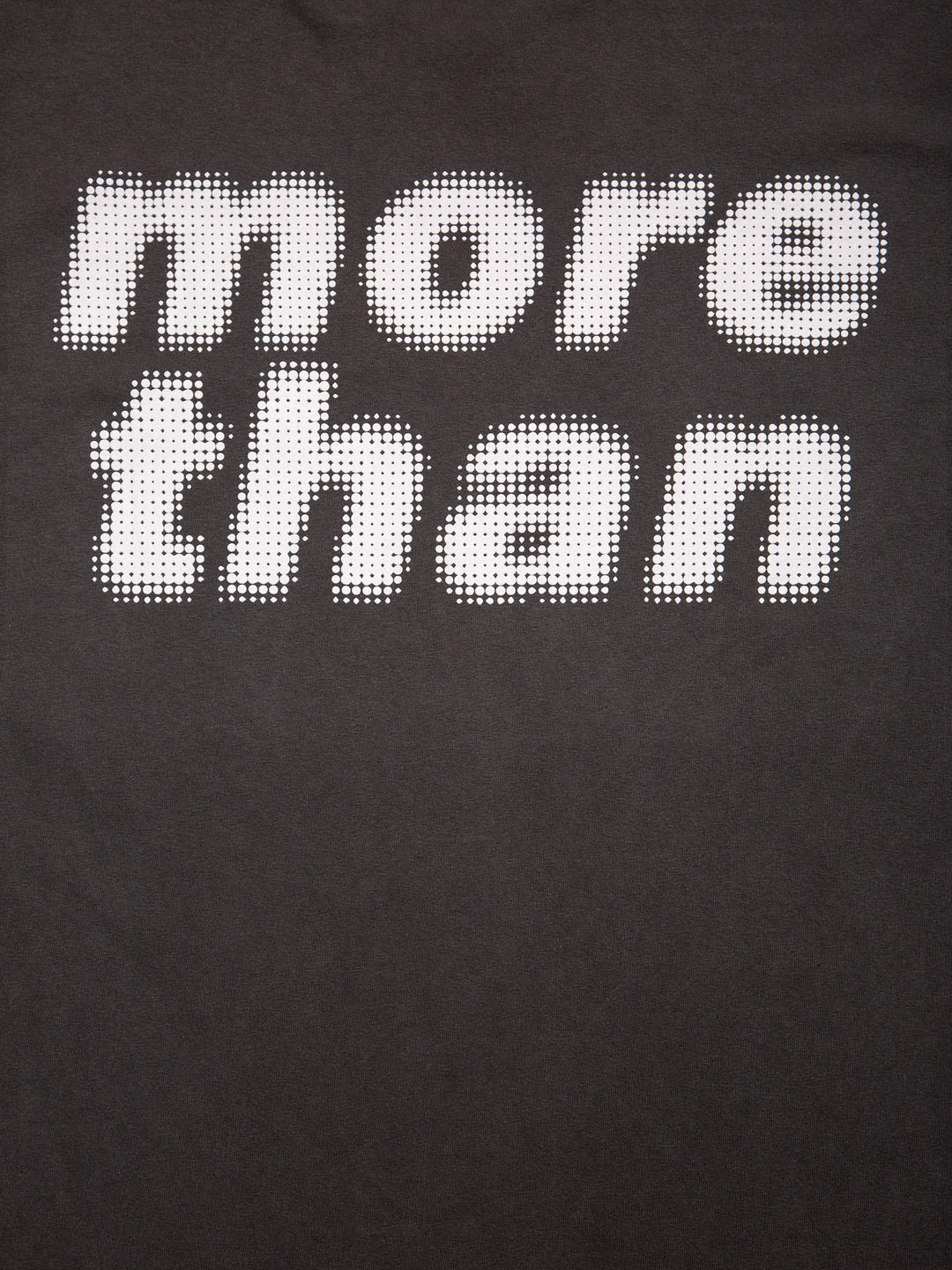 MORE THAN PIXELATED ATTRIBUTE TEE VINTAGE BLACK - detail of "more than" writing