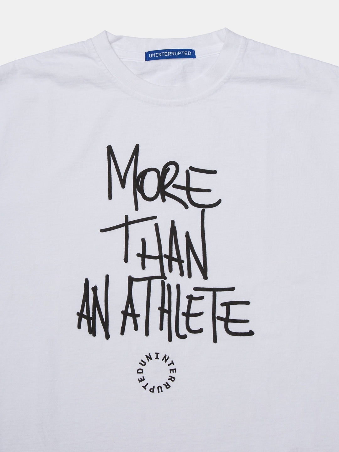 More Than An Athlete Venice Tee White - close up of writing